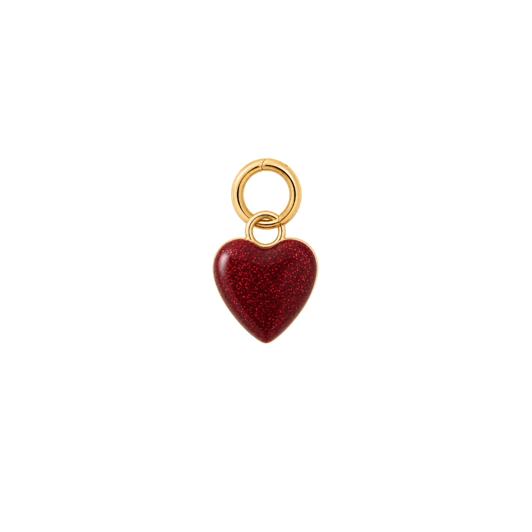 A small heart-shaped charm with a sparkling dark red glitter finish and a gold-tone ring at the top, shown on a plain white background.